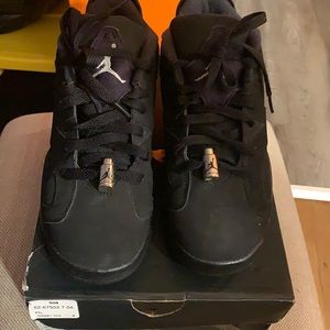 Jordan low 6’s .All Black. Youth size 7. Worn/In good condition.